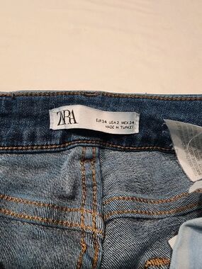 Zara jeans with black down sides